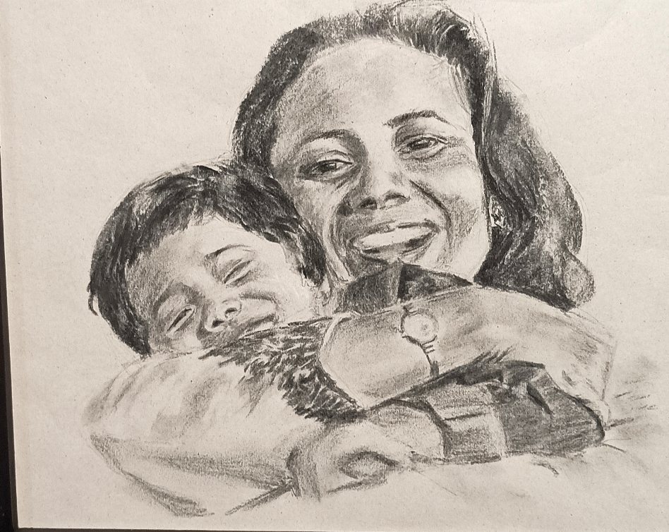 Smiling woman holding her child